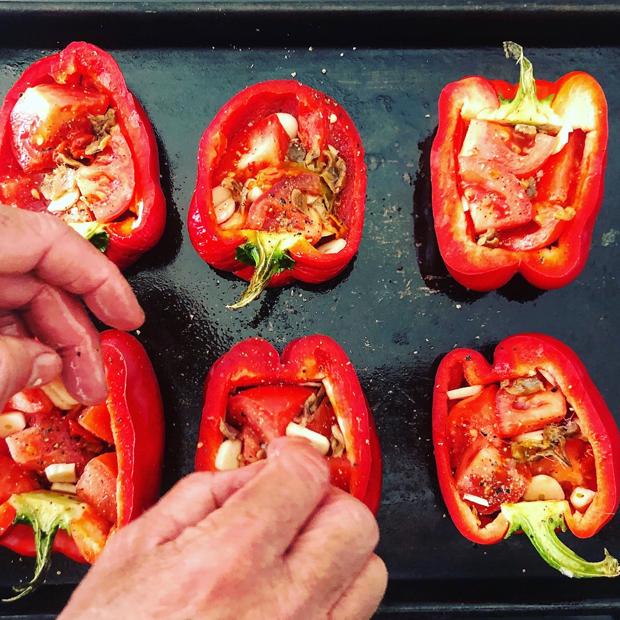 Roast Red Peppers With Cherry Tomatoes Garlic And Anchovies The Gloss Magazine