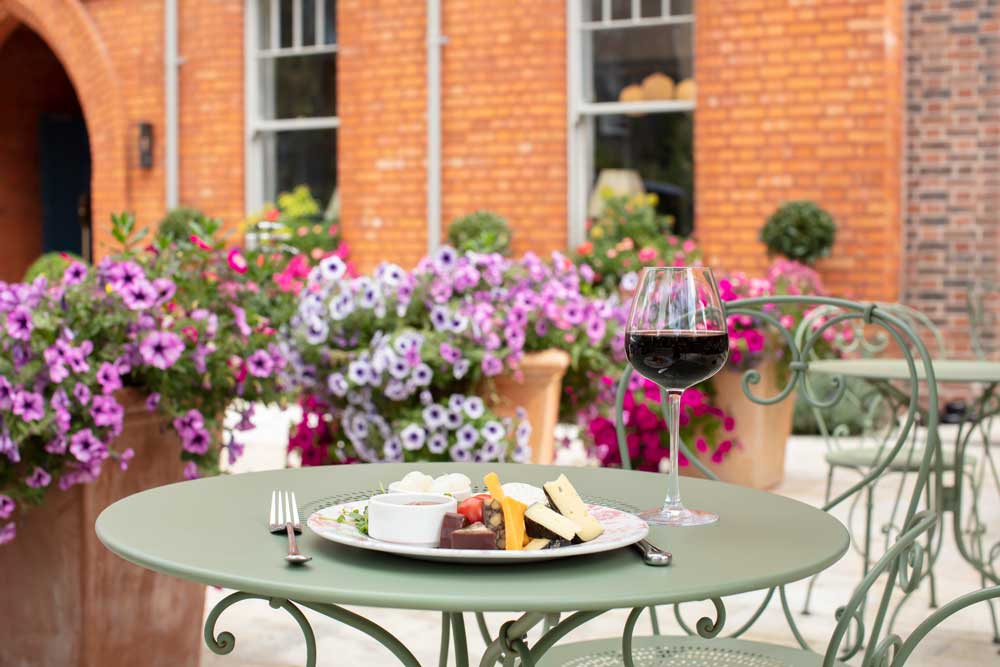 The-Gloss-Magazine-Cheese-Plate-Red-Wine-on-Terrace