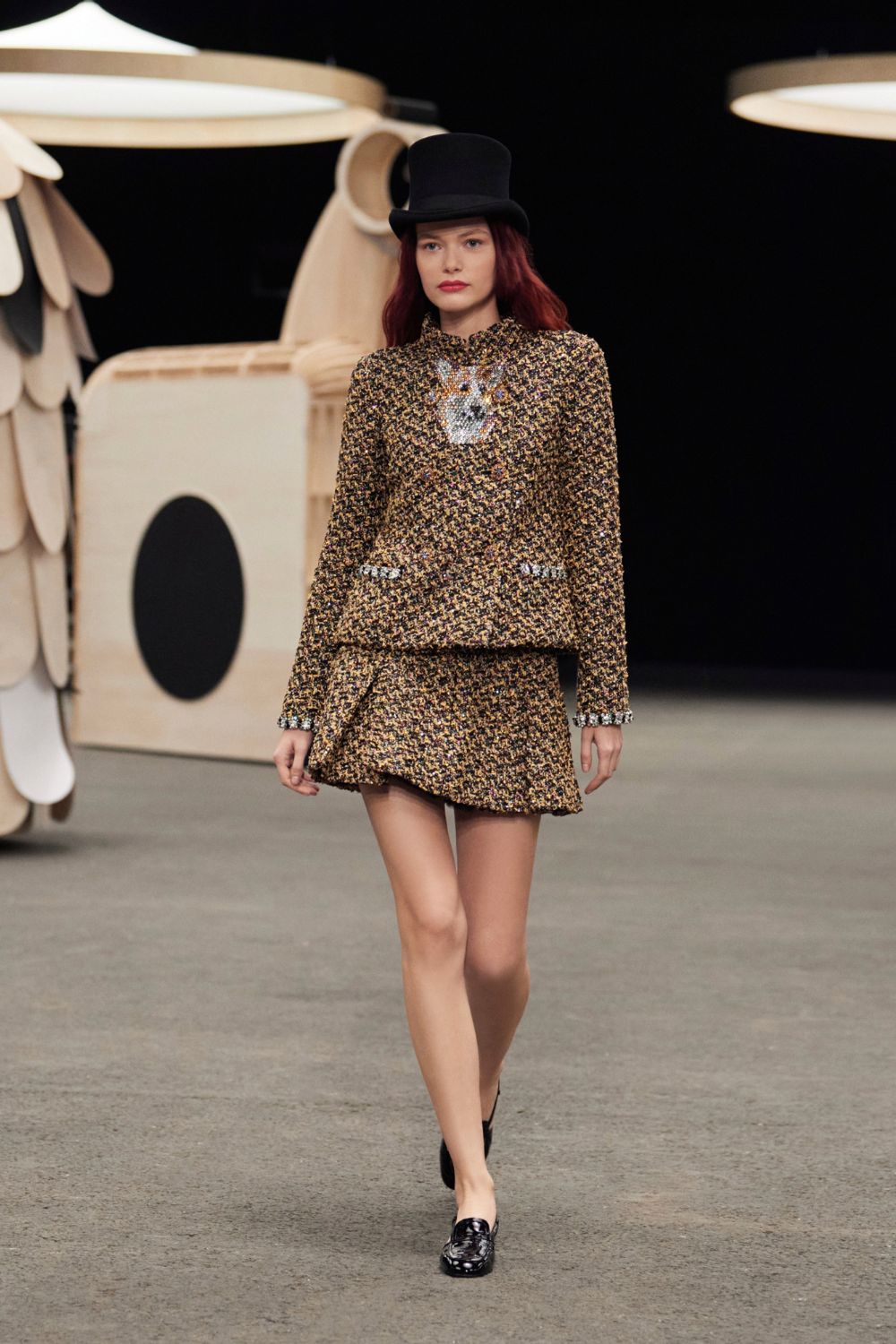 In the Chanel haute couture collection, there is a parade of