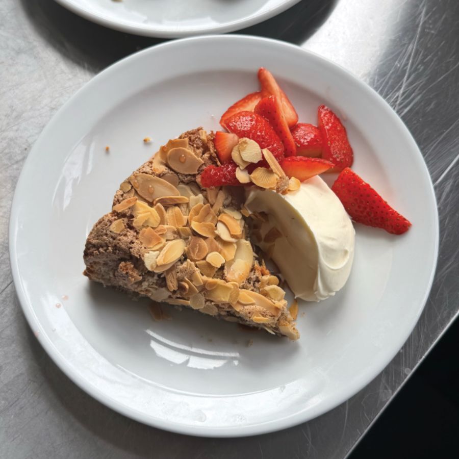 Save Kitty Coles' five-step recipe for pecan and almond macaron cake with cream and strawberries for summer dessert